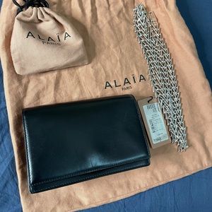 Alaia black leather bag with silver strap